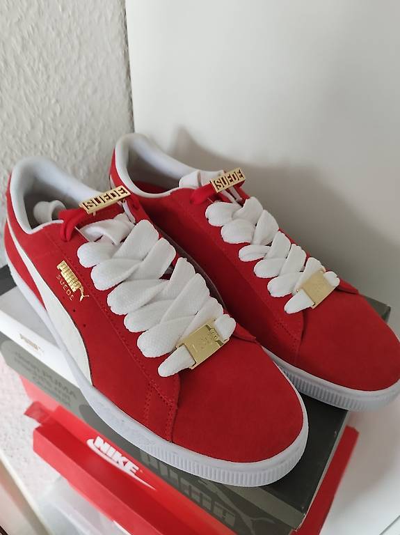 Puma suede rouge porté best sale